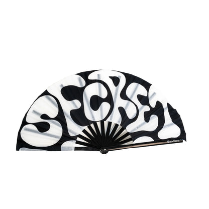 Black and white fan with abstract design on a white background